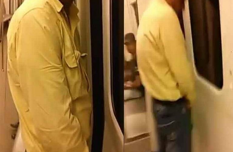 man caught peeing inside delhi metro